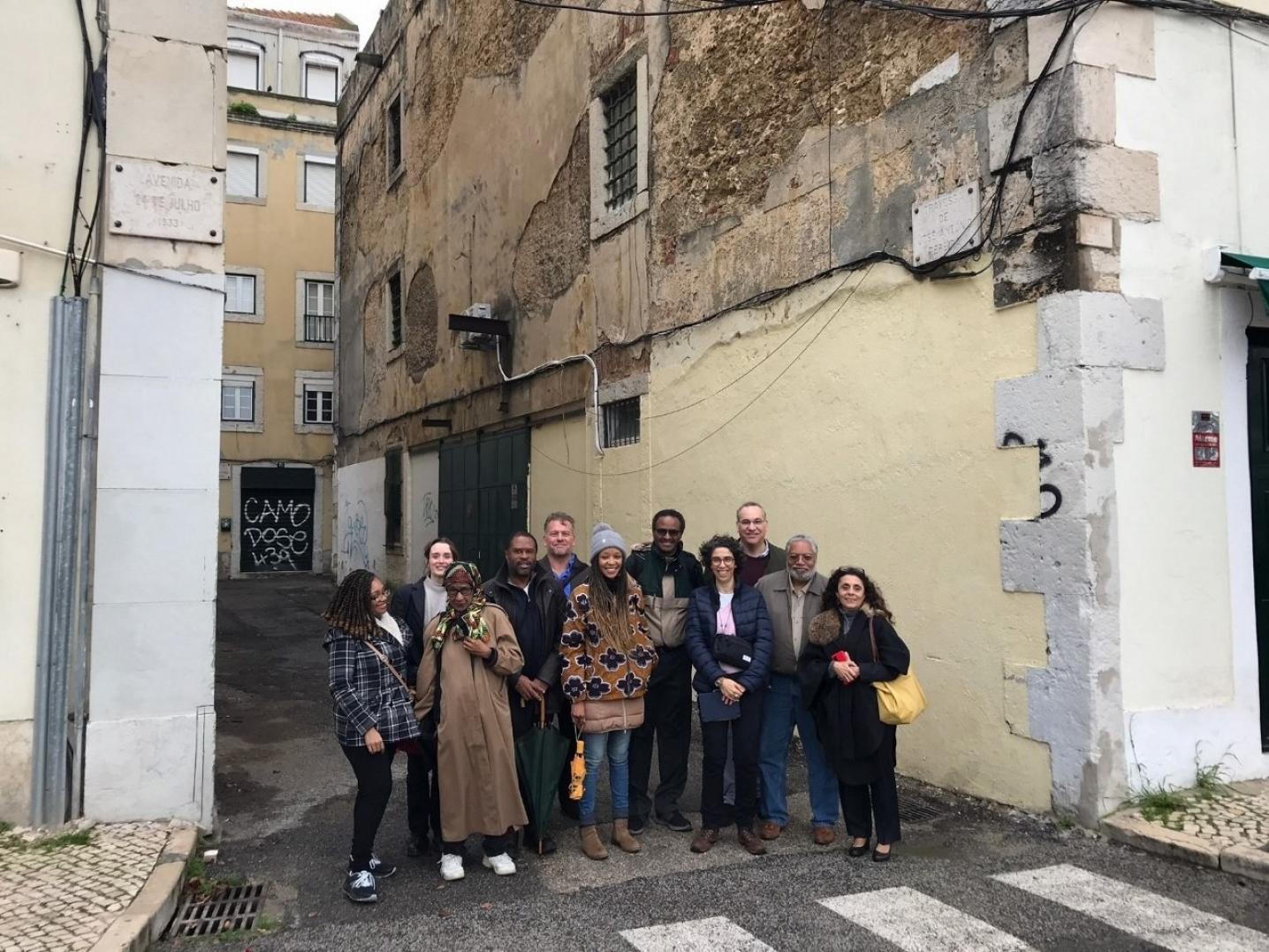Group of people standing in a street in Lisbon, Portugal