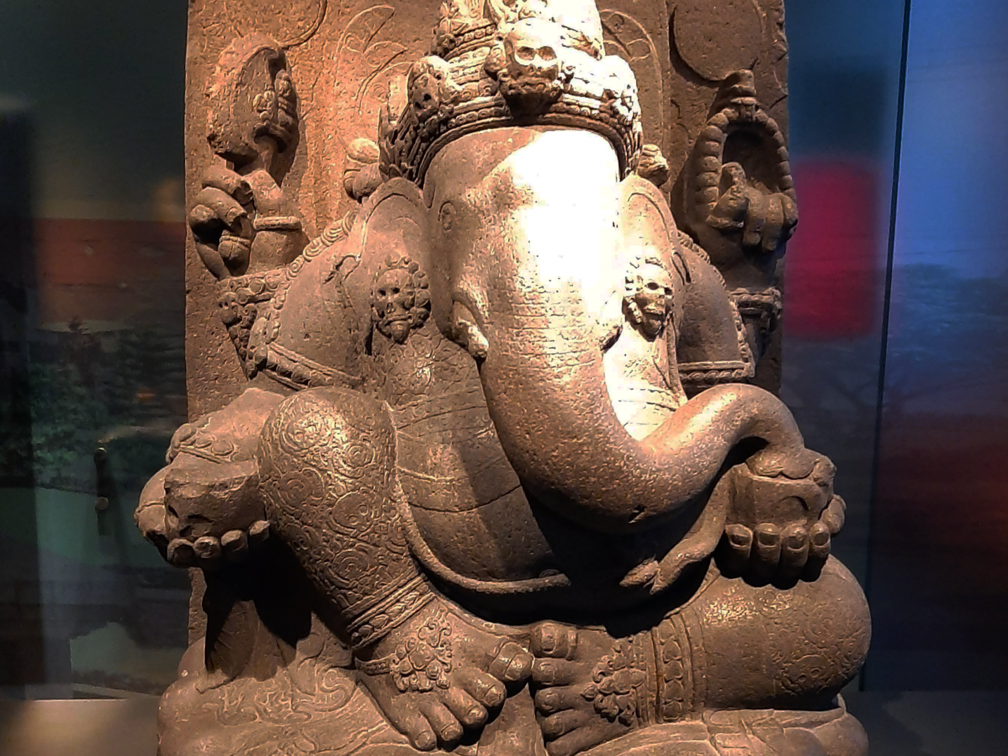 A stone statue of Krishna in the shape of a an elephant.